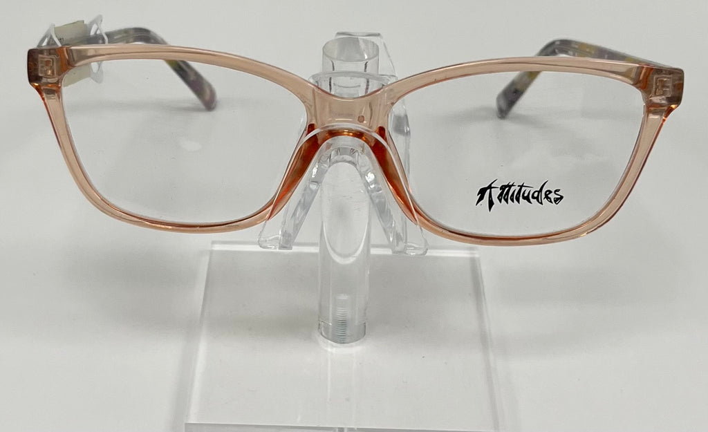 A pair of peach-colored eyeglasses with bold purple and yellow temples, displayed on a stand.
