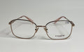 Coach eyeglasses with a metallic rose gold frame and clear lenses, featuring the Coach logo on the lower right lens and a handwritten price of 23.99 on the upper right lens.