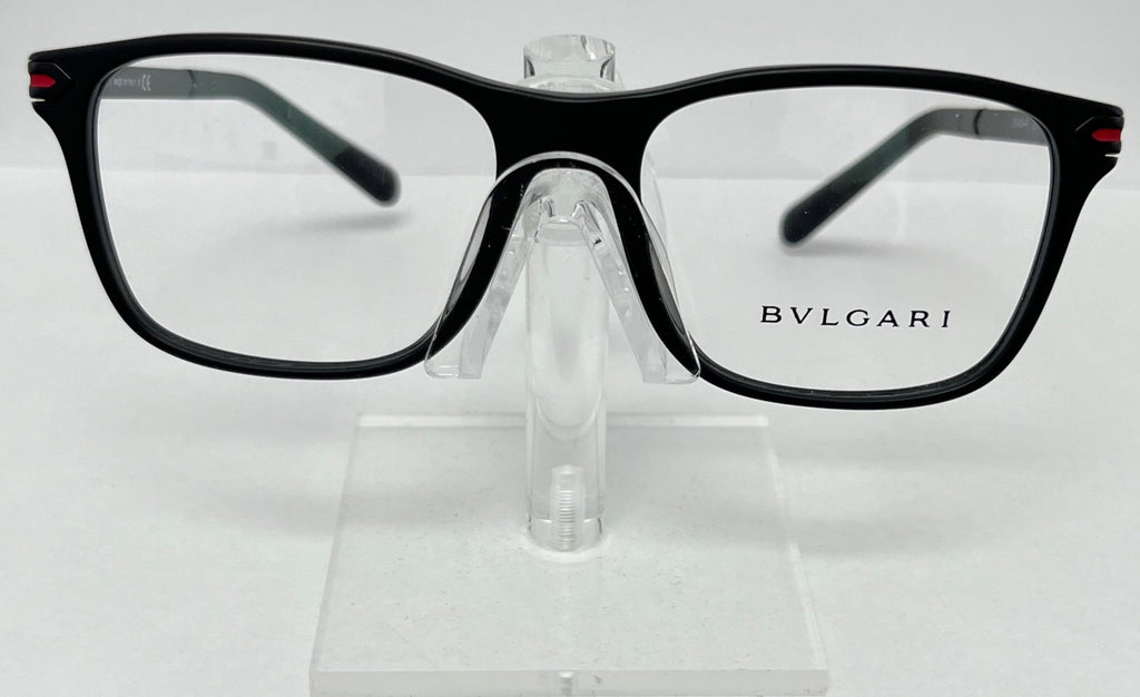 Bulgari eyeglasses on a clear stand against a white background