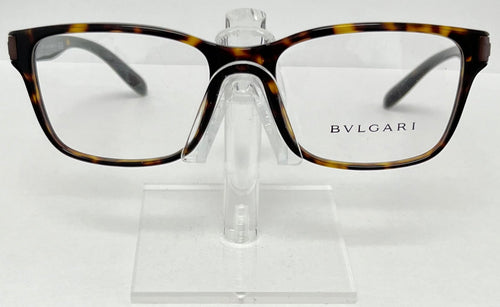 Bulgari eyeglasses on a clear stand against a white background