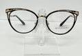Bulgari eyeglasses on a clear stand against a white background