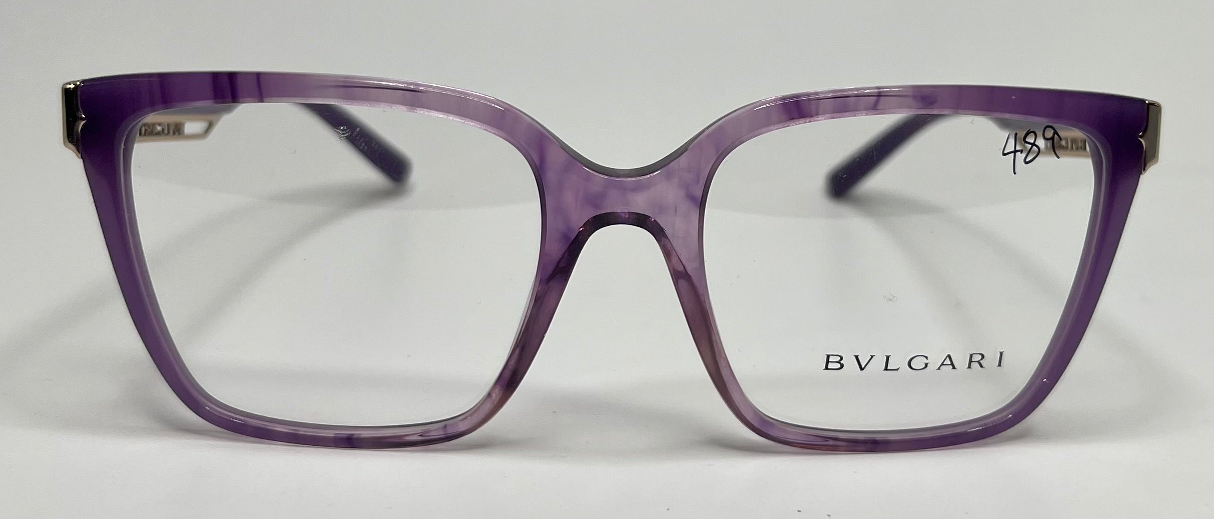 Purple Bvlgari eyeglasses on a white background
