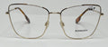 Gold Burberry eyeglasses on a white background
