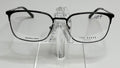 A sleek gunmetal stainless steel eyeglass frame by Ted Baker displayed on a stand.