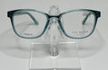 A pair of Ted Baker TPW001 eyeglasses with transparent sea green frames displayed on a stand.