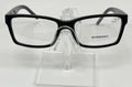 Black Burberry eyeglasses on a clear stand against a white background